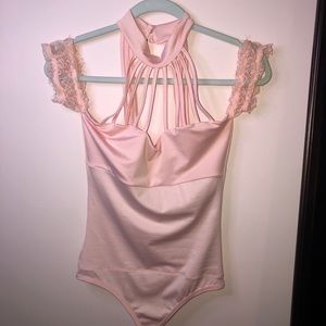 Pale pink bodysuit